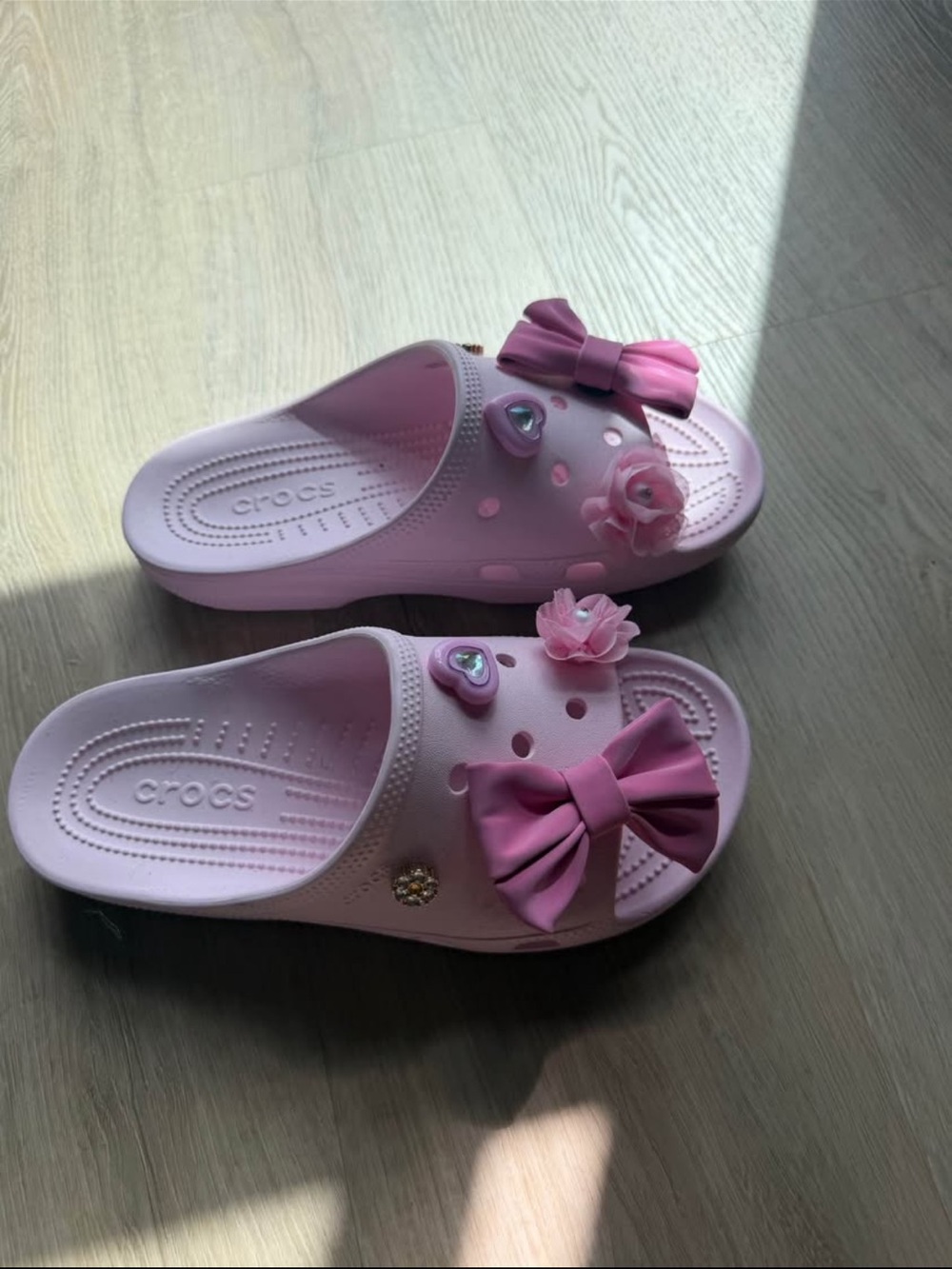 CROCS Pink Slide Sandals with Bows and Charms